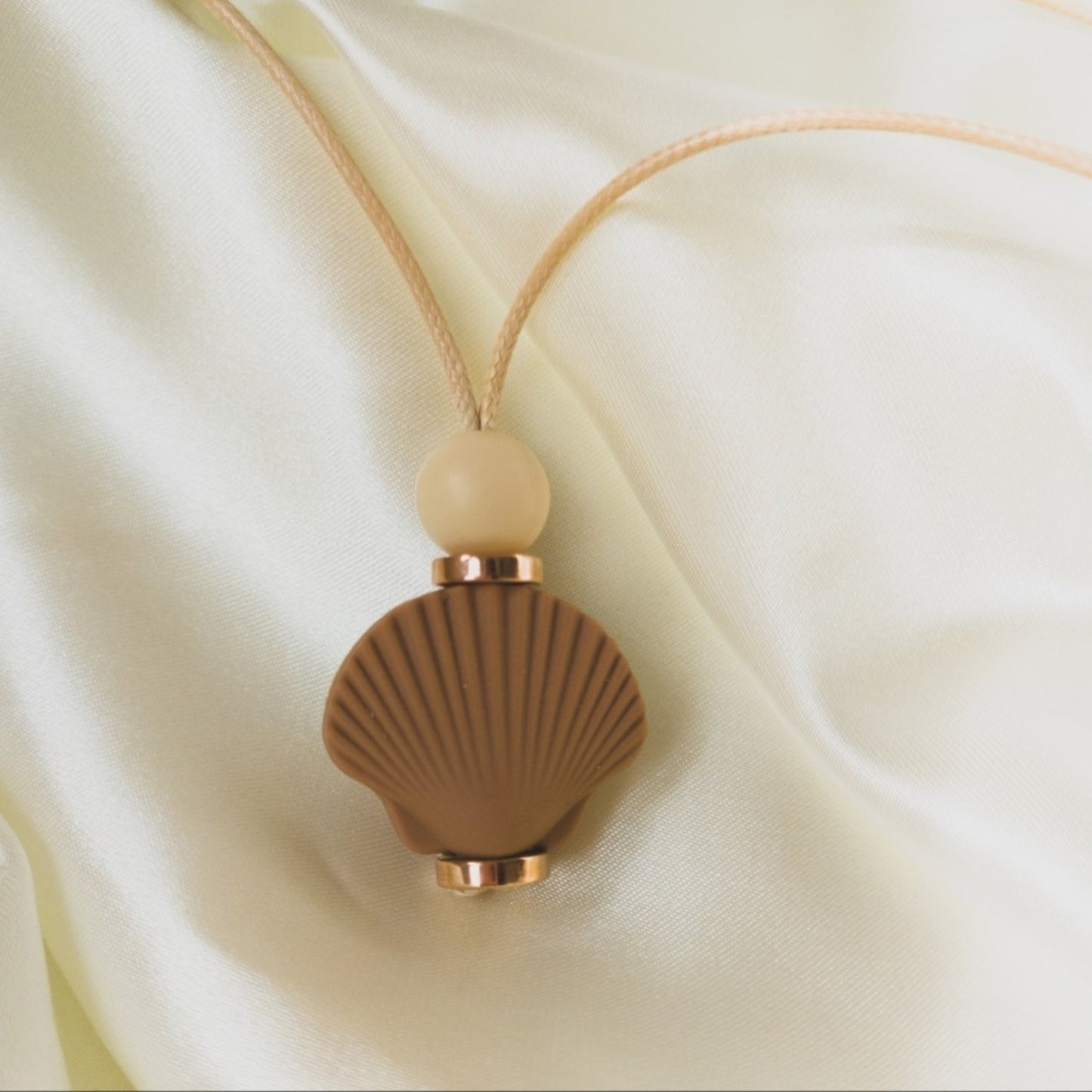 Bloomshell Pendant - Bennie Blooms Breastfeeding, Teething and Fiddle Jewellery at its finest.