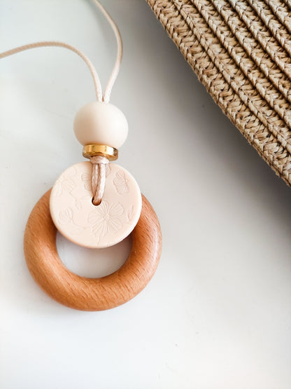 Embossed Cream Bloom Pendant - Bennie Blooms Breastfeeding, Teething and Fiddle Jewellery at its finest.