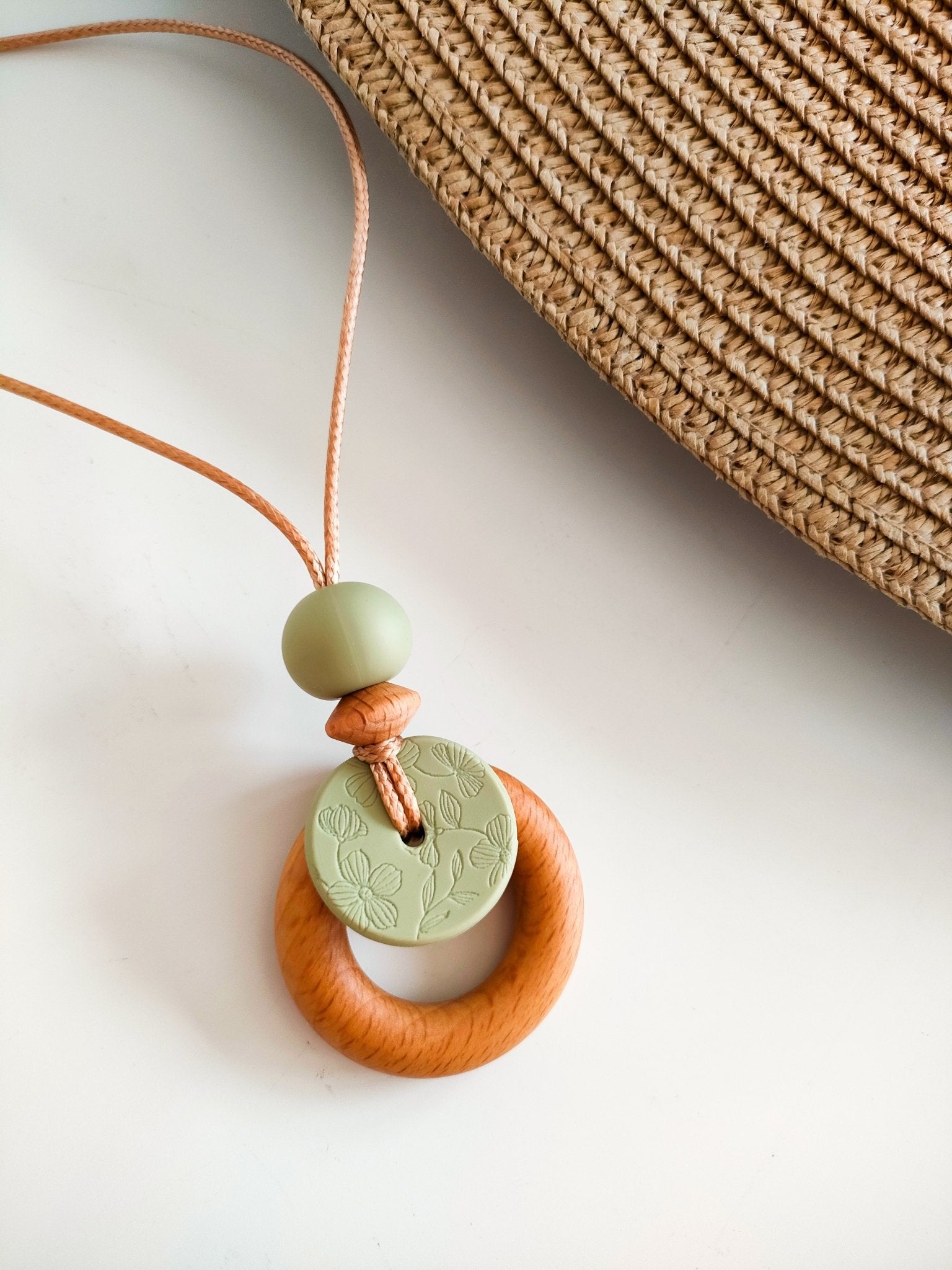 Embossed Lint Bloom Pendant - Bennie Blooms Breastfeeding, Teething and Fiddle Jewellery at its finest.