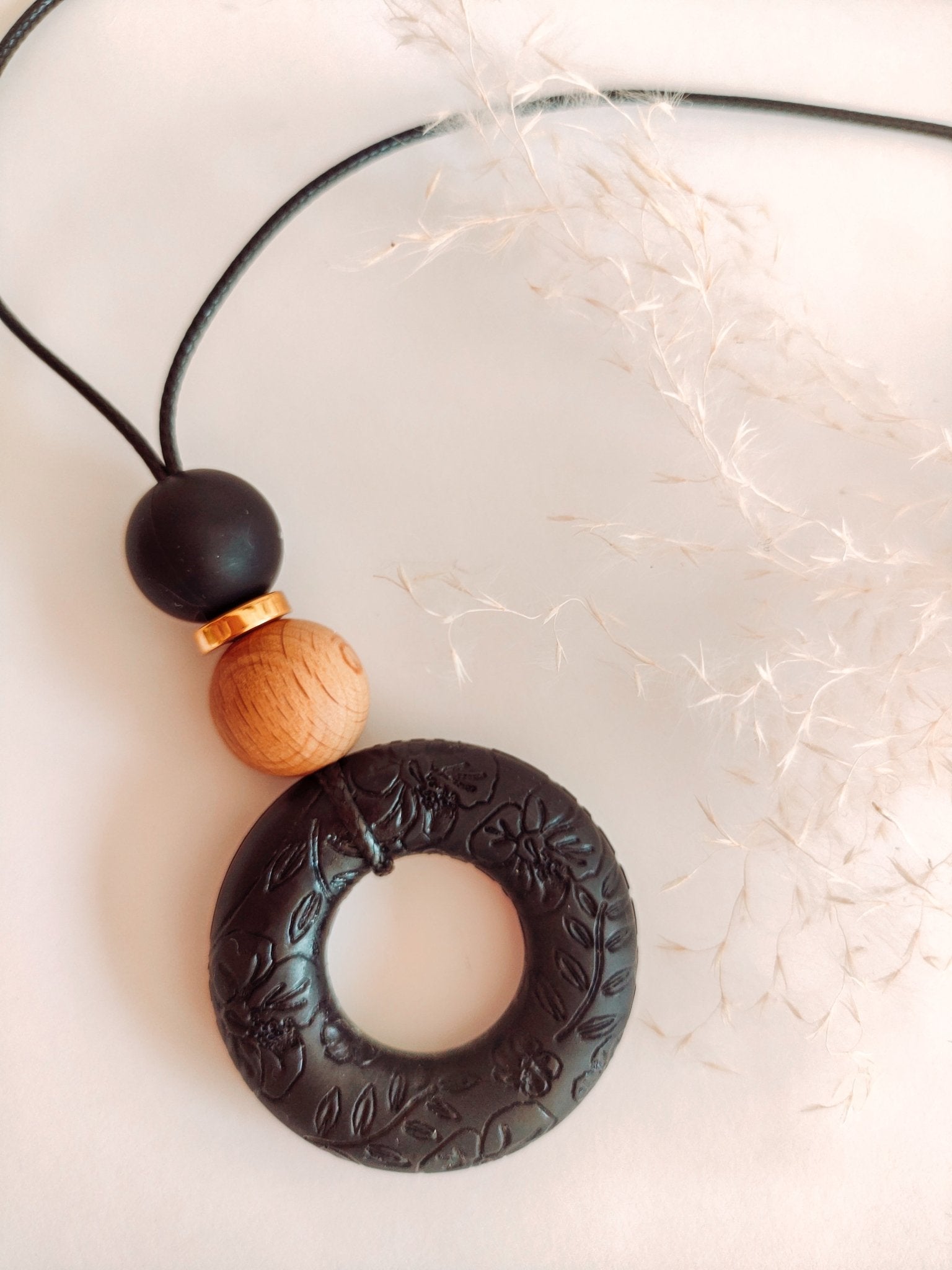 Embossed Soft Bloom Black Pendant - Bennie Blooms Breastfeeding, Teething and Fiddle Jewellery at its finest.