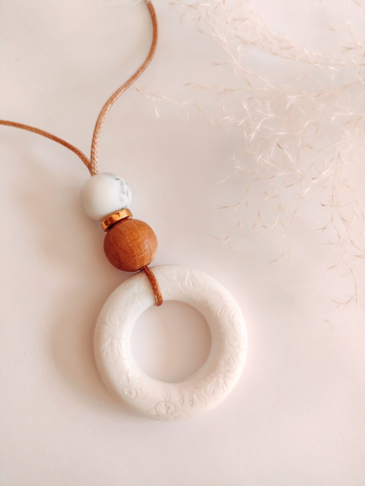 Embossed Soft Bloom white Pendant - Bennie Blooms Breastfeeding, Teething and Fiddle Jewellery at its finest.